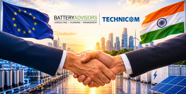 Handshake in front of the flags of the EU and India, below the Battery Advisors and Technicom logos, with wind turbines, battery storage and solar panels